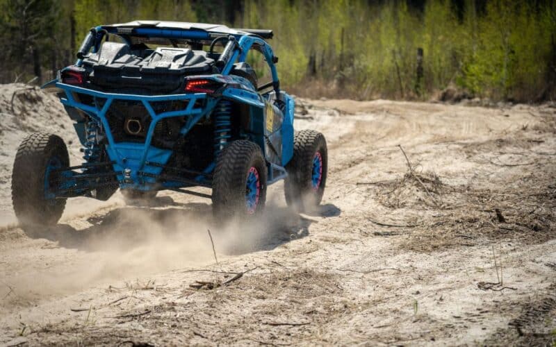 UTV driving in a dirt area