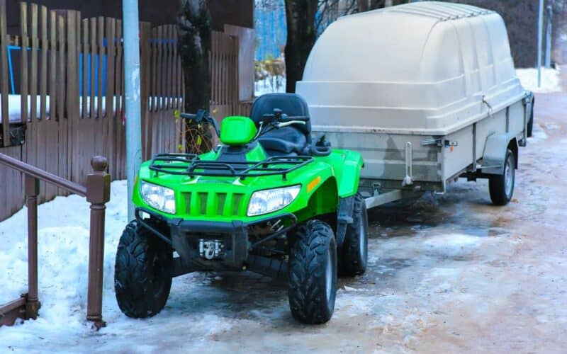 atv with trailer in snow