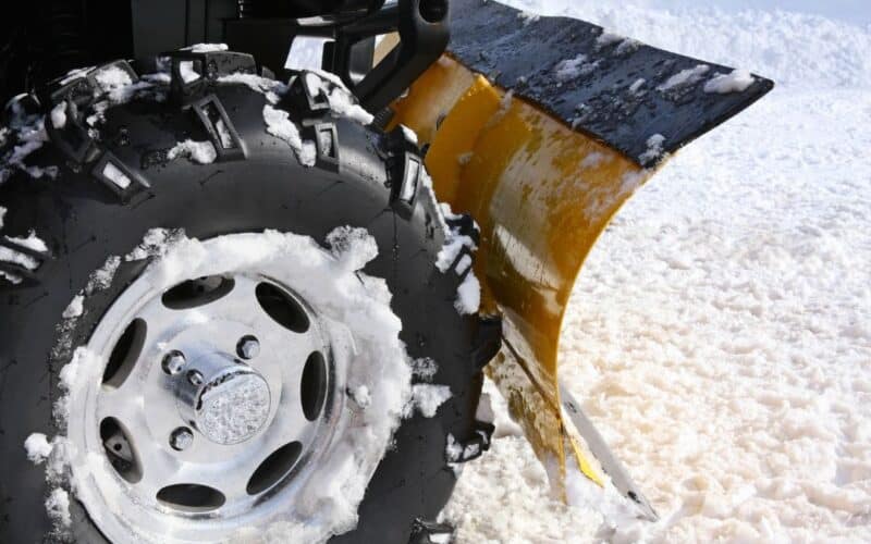 atv plow in snow