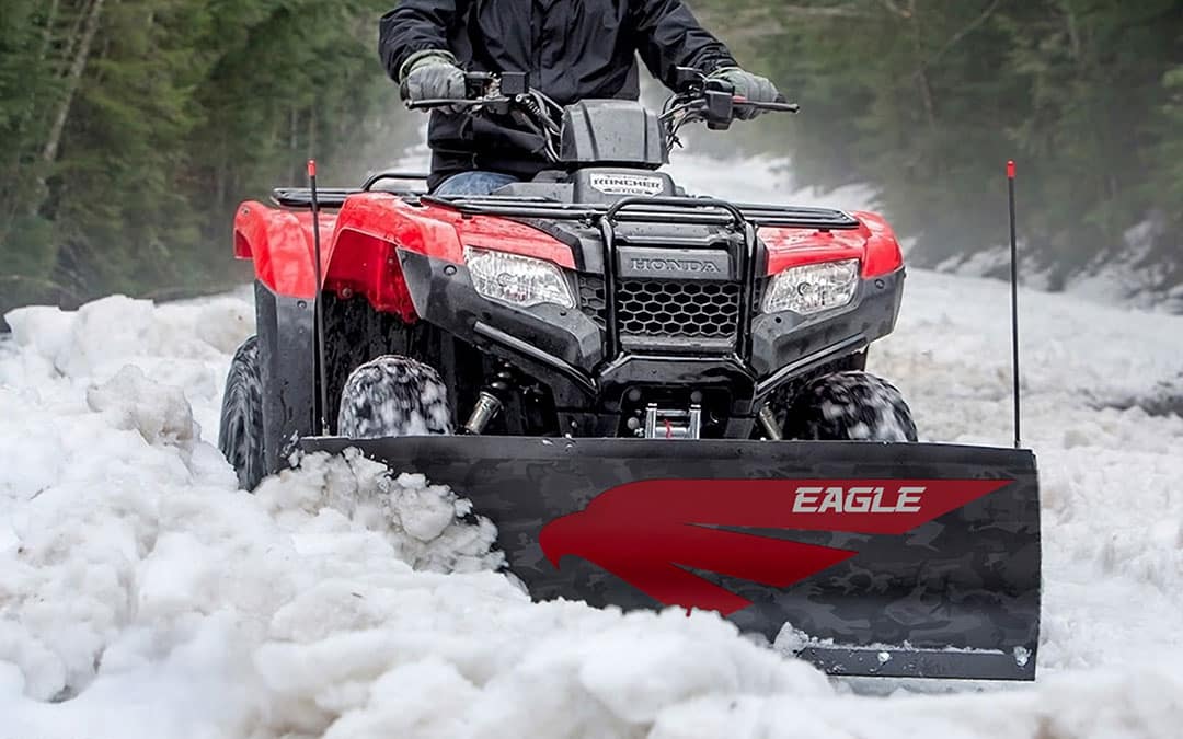 Eagle Plow ATV snow plow clearing a driveway