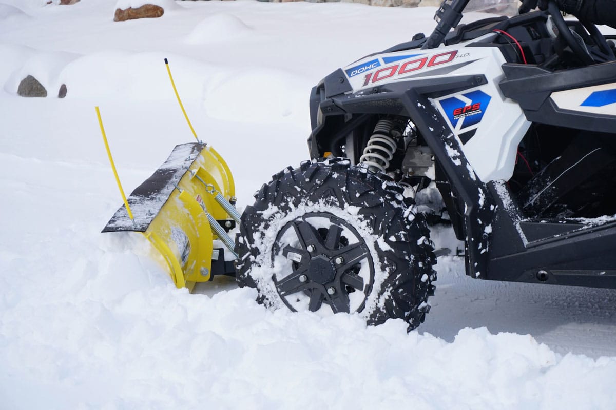 Measuring the front tire stance of an ATV for plow blade sizing