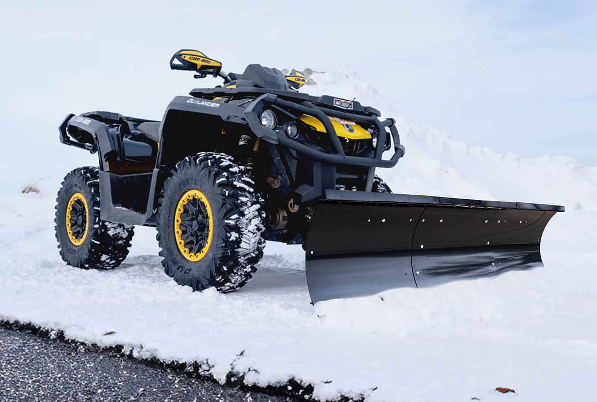 ATV with attached snow plow